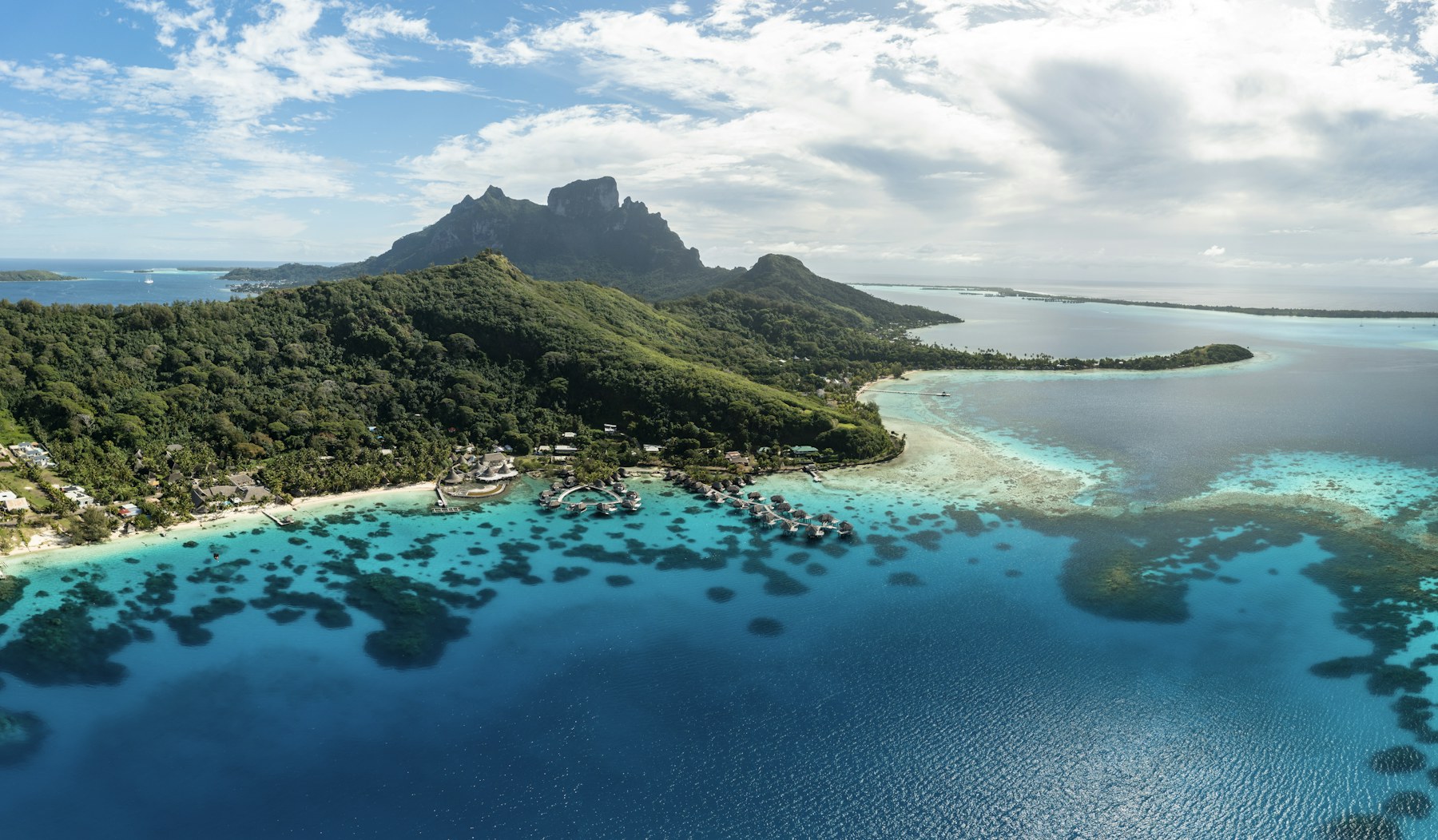 Turquoise lagoon and green island in Bora Bora